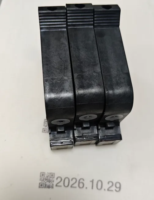 Three solvent TIJ cartridges from the same production batch standing on a printed test slip carrying a 2D code and the date 2026.10.29